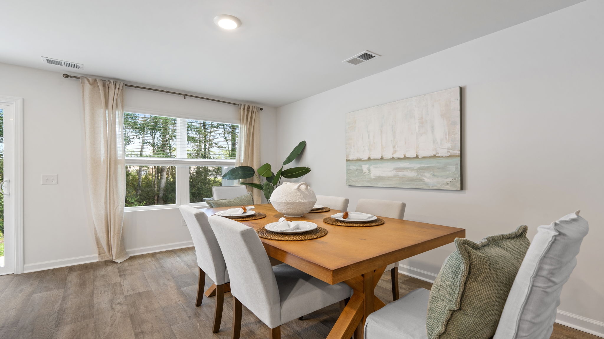 Dining area overlooking the main living space in the Denmark floor plan