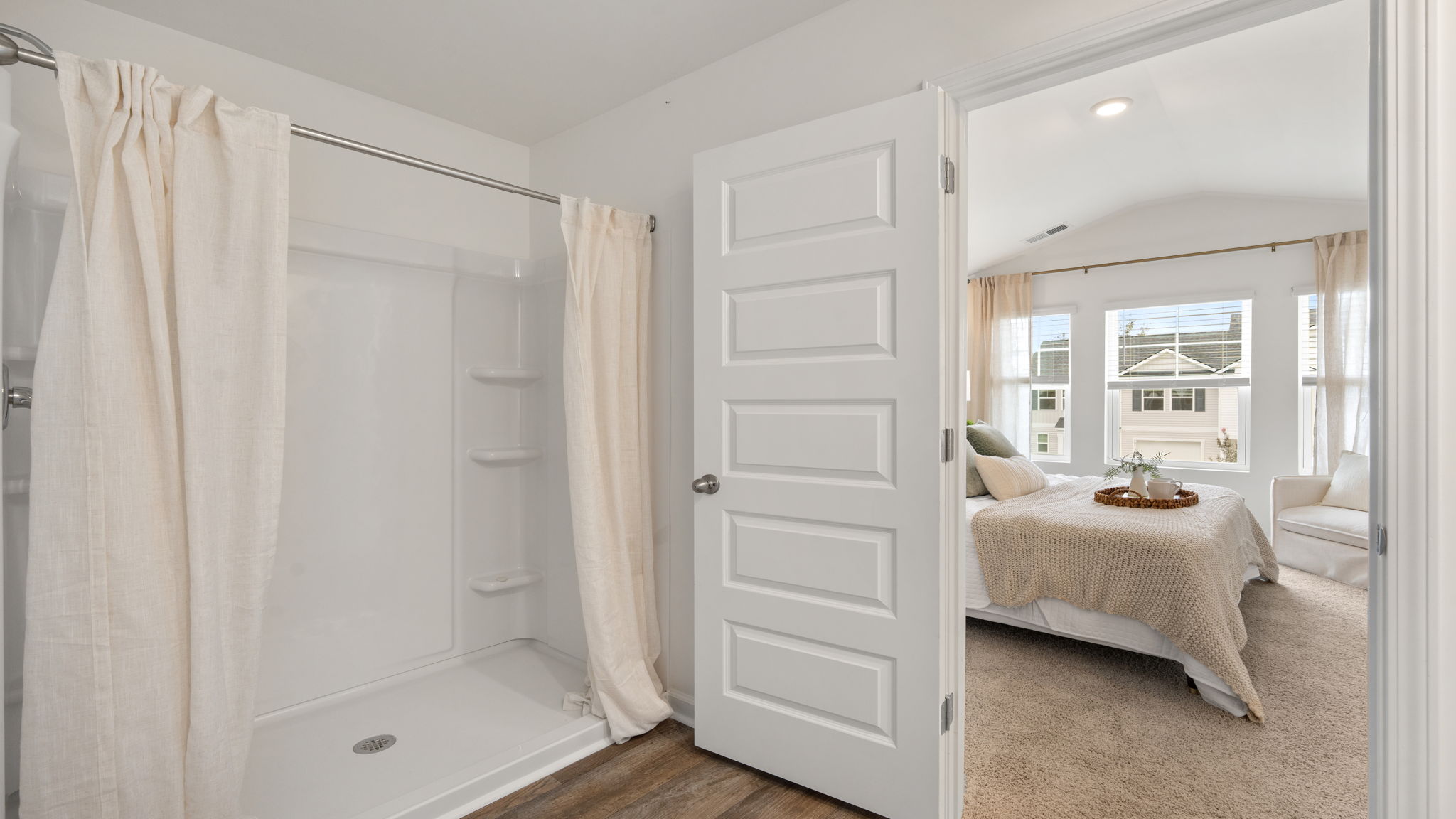 Primary bathroom entrance and suite connection in the Denmark floor plan