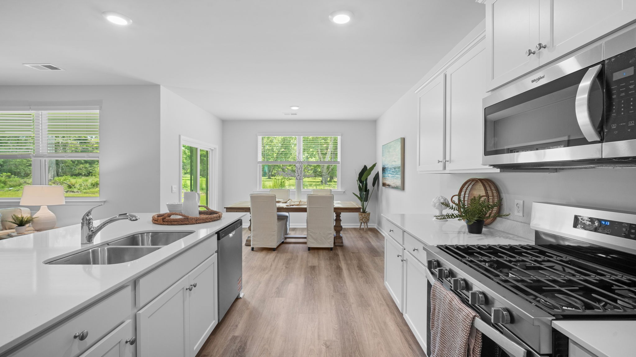 Chef-inspired kitchen with spacious countertops, modern finishes, and functional layout.
