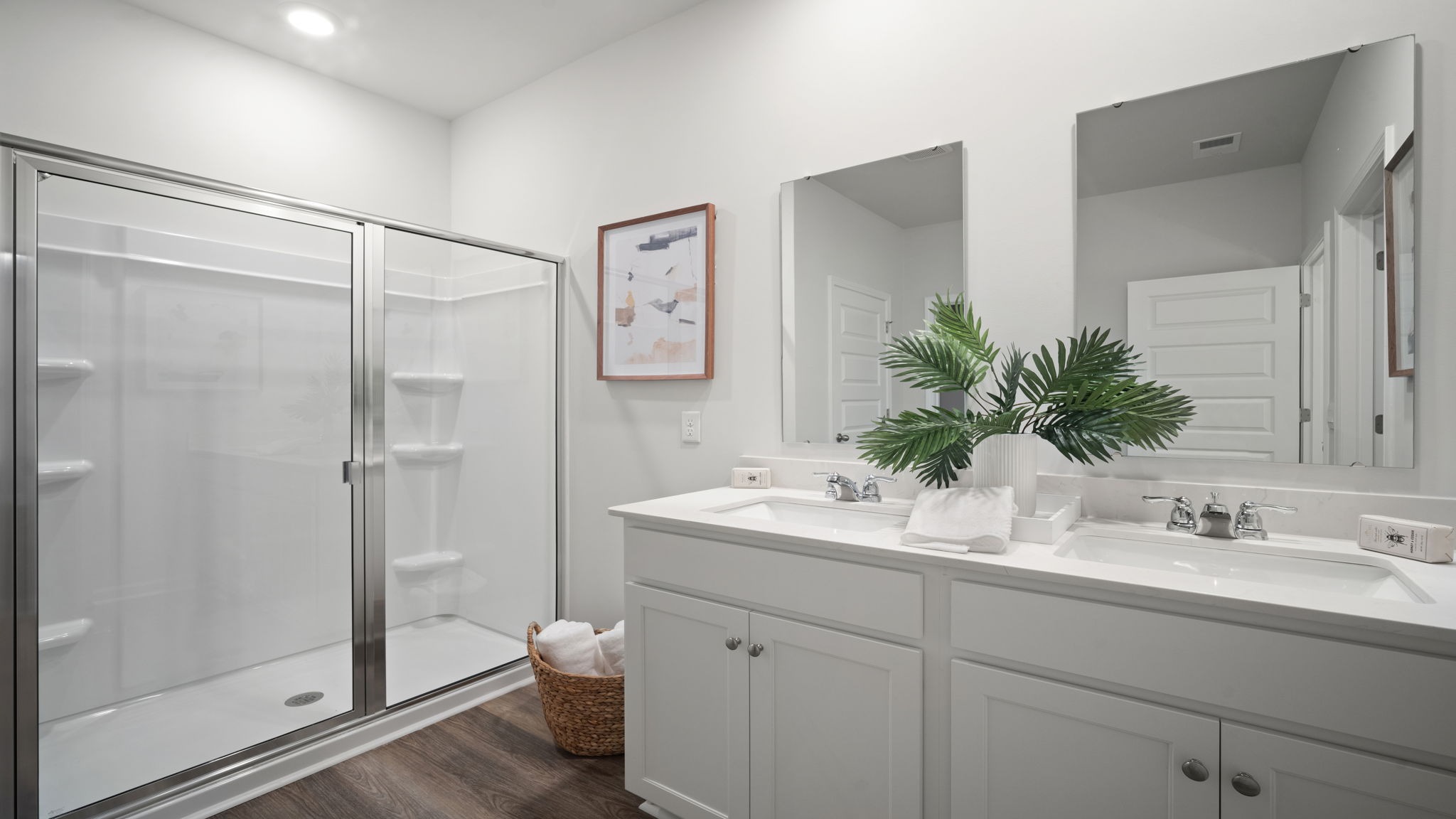 Elegant owner's bath featuring modern fixtures and spacious functionality.