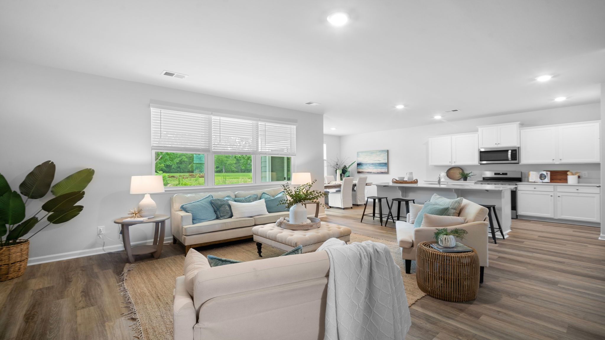 Spacious family room featuring open-concept living and abundant natural light.