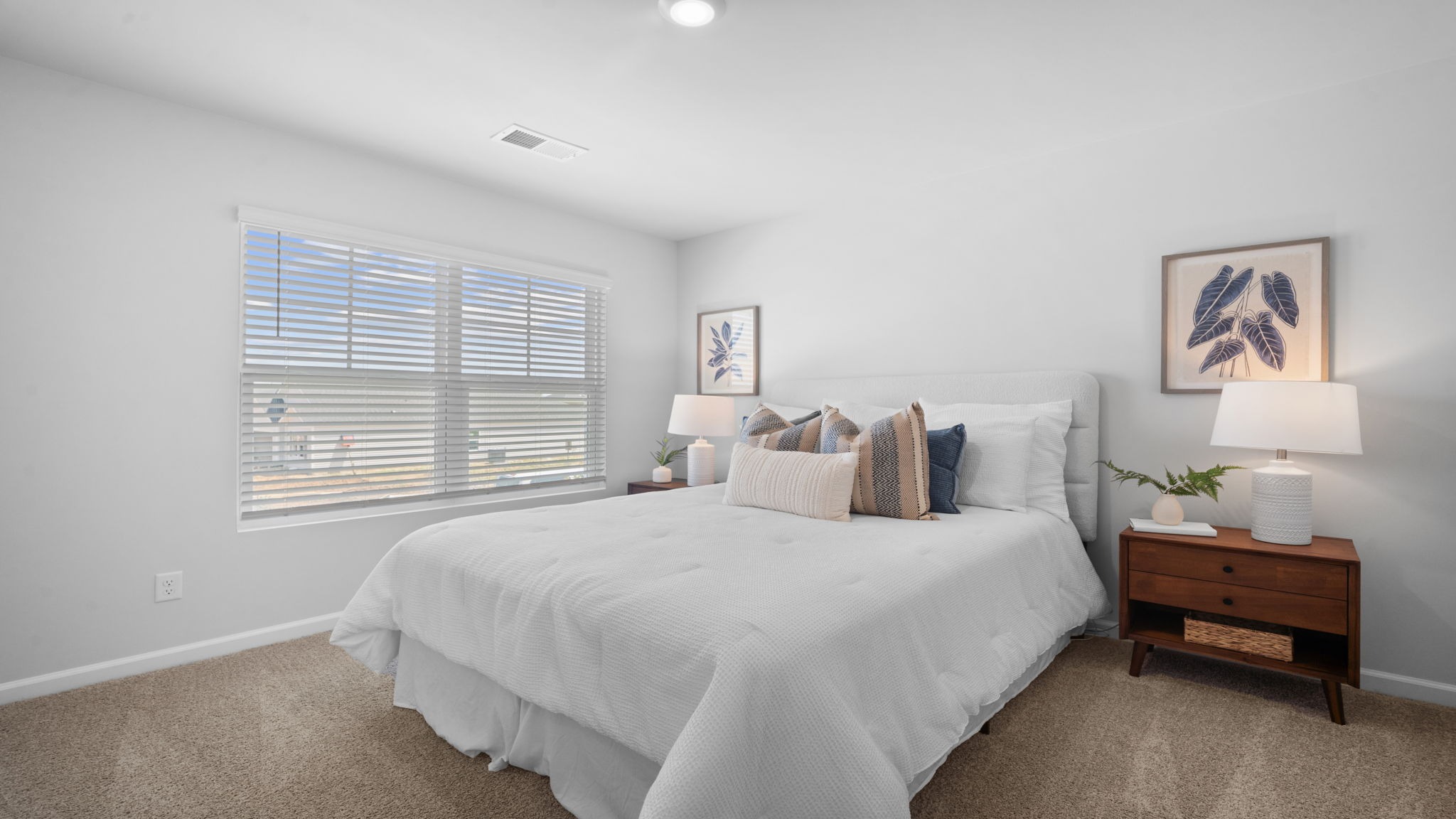 Secondary bedroom in the Belhaven floor plan offering versatility for guests, family members, or a home office.