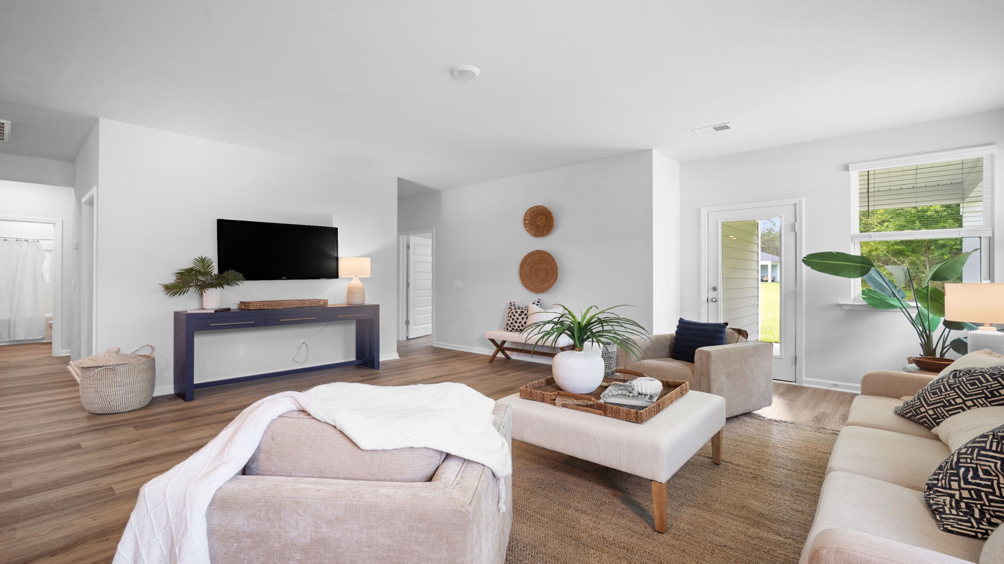 Living area of home decorated with seating