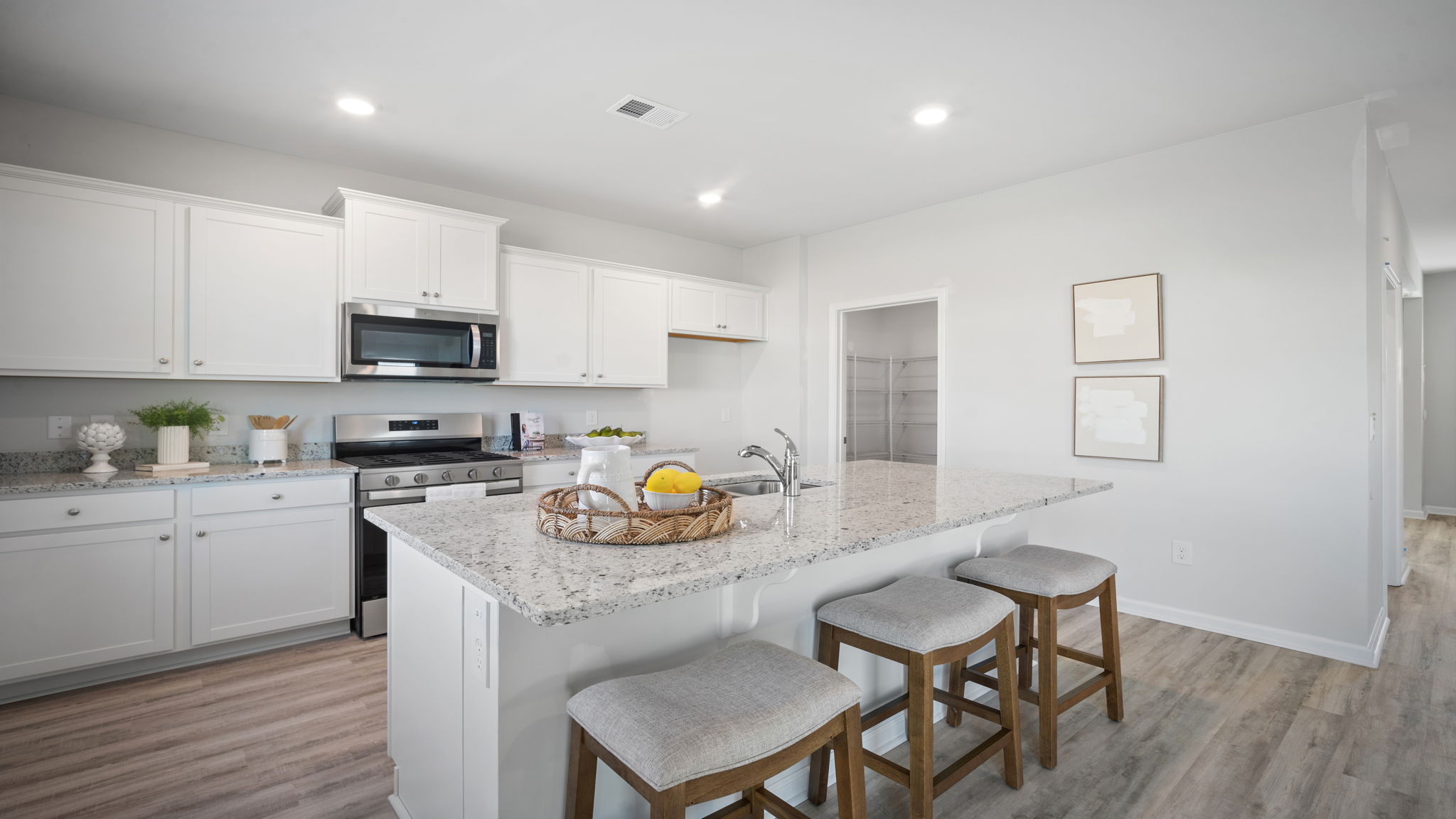 Bright kitchen in the D.R. Horton Galen featuring ample counter space and seamless flow to living areas.