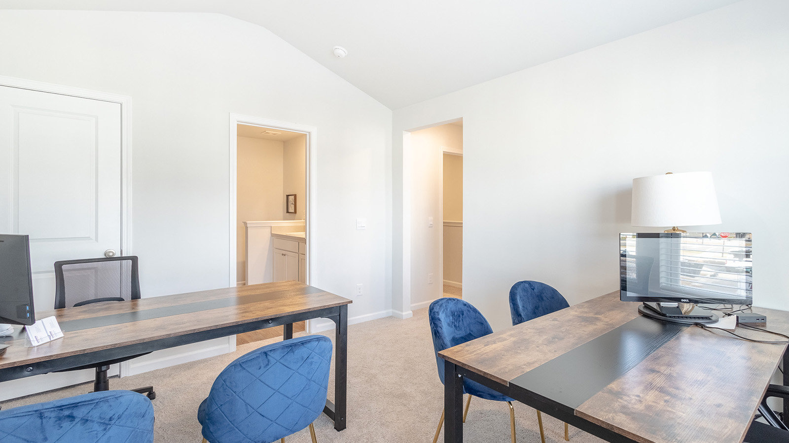 Dedicated home office in the Duncan floorplan at The Towns at Blue Jay by D.R. Horton featuring abundant natural light, flexible workspace, modern finishes, and a quiet environment ideal for remote work, studying, or creative projects.