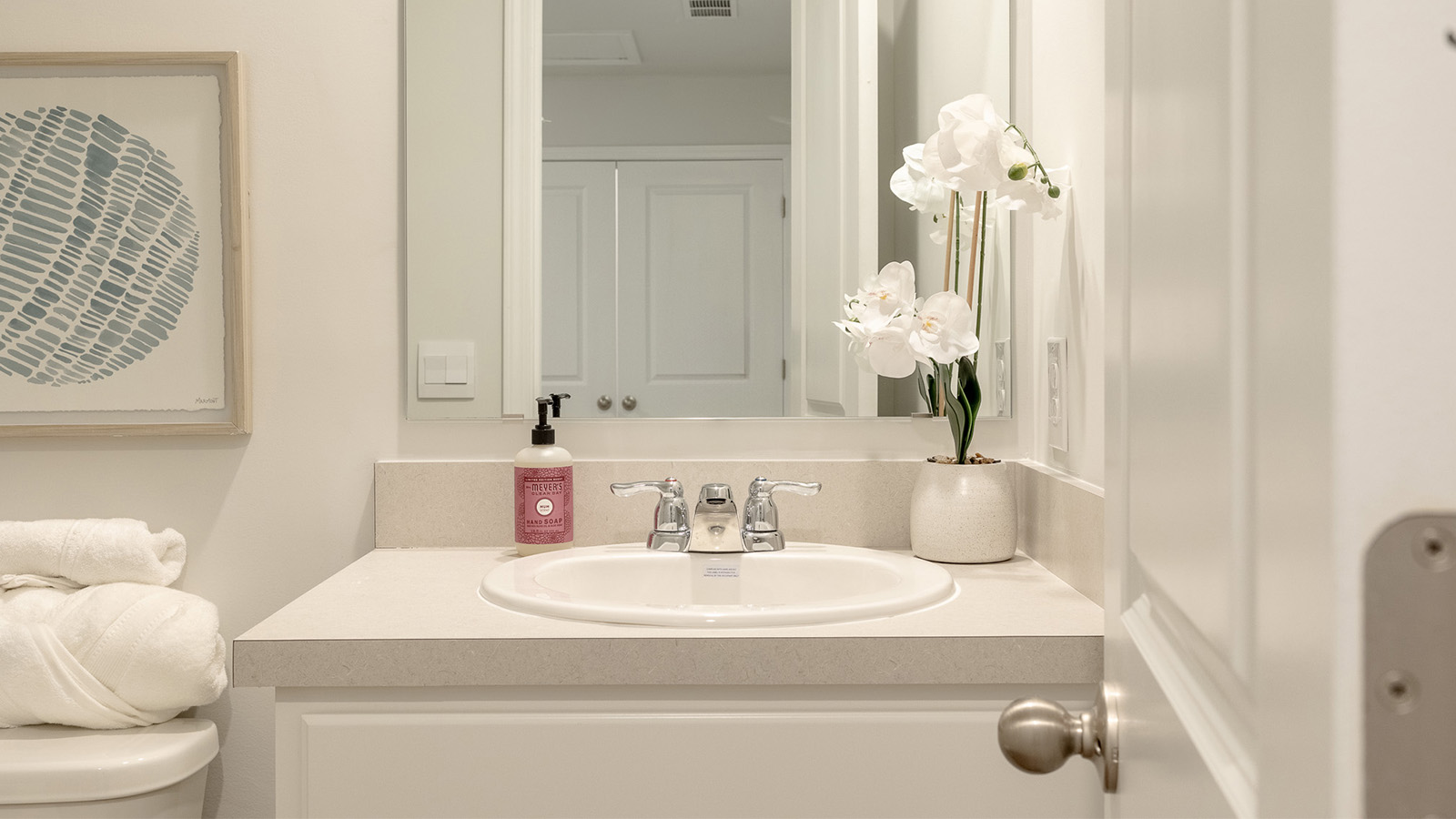 Well-appointed guest bathroom in the Duncan floorplan featuring modern fixtures, vanity storage, durable finishes, and convenient access for residents and visitors.
