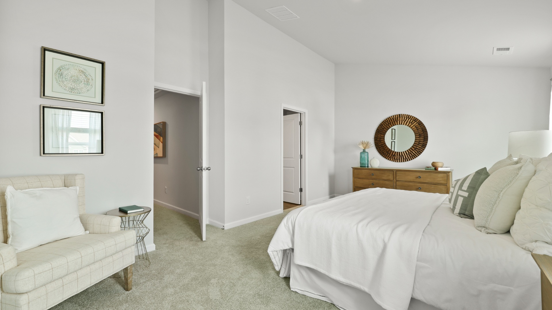 Spacious primary bedroom in the Dillon floorplan by D.R. Horton featuring a private retreat with ample natural light, generous square footage, and a relaxing atmosphere.