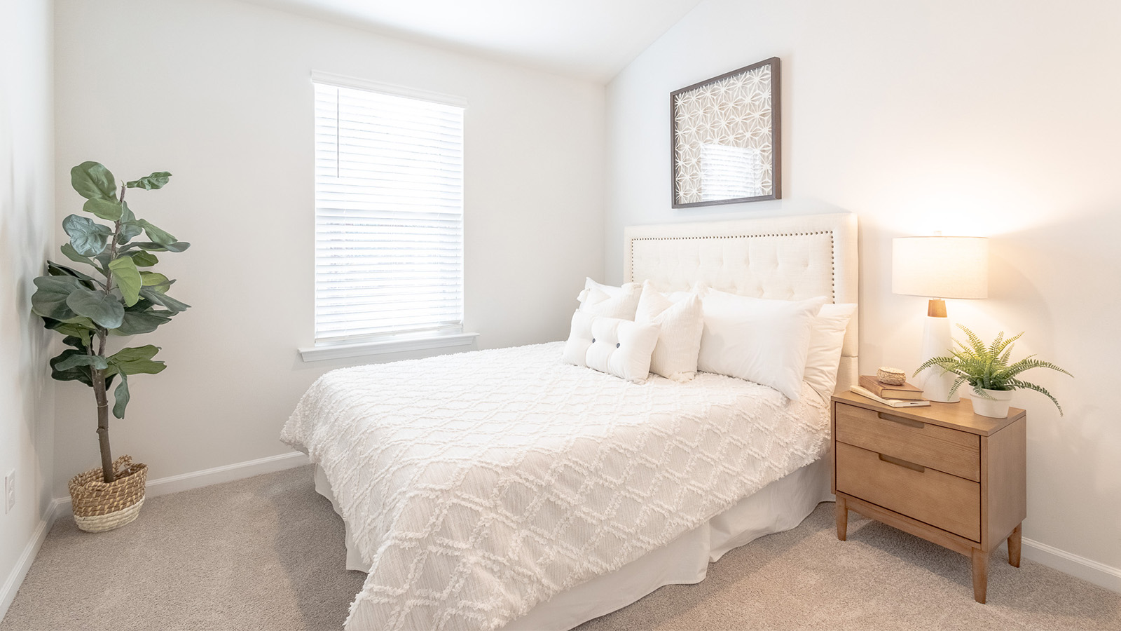 Spacious primary bedroom in the Dillon floorplan by D.R. Horton at The Towns at Blue Jay featuring large windows, modern finishes, and a relaxing retreat designed for comfort and privacy