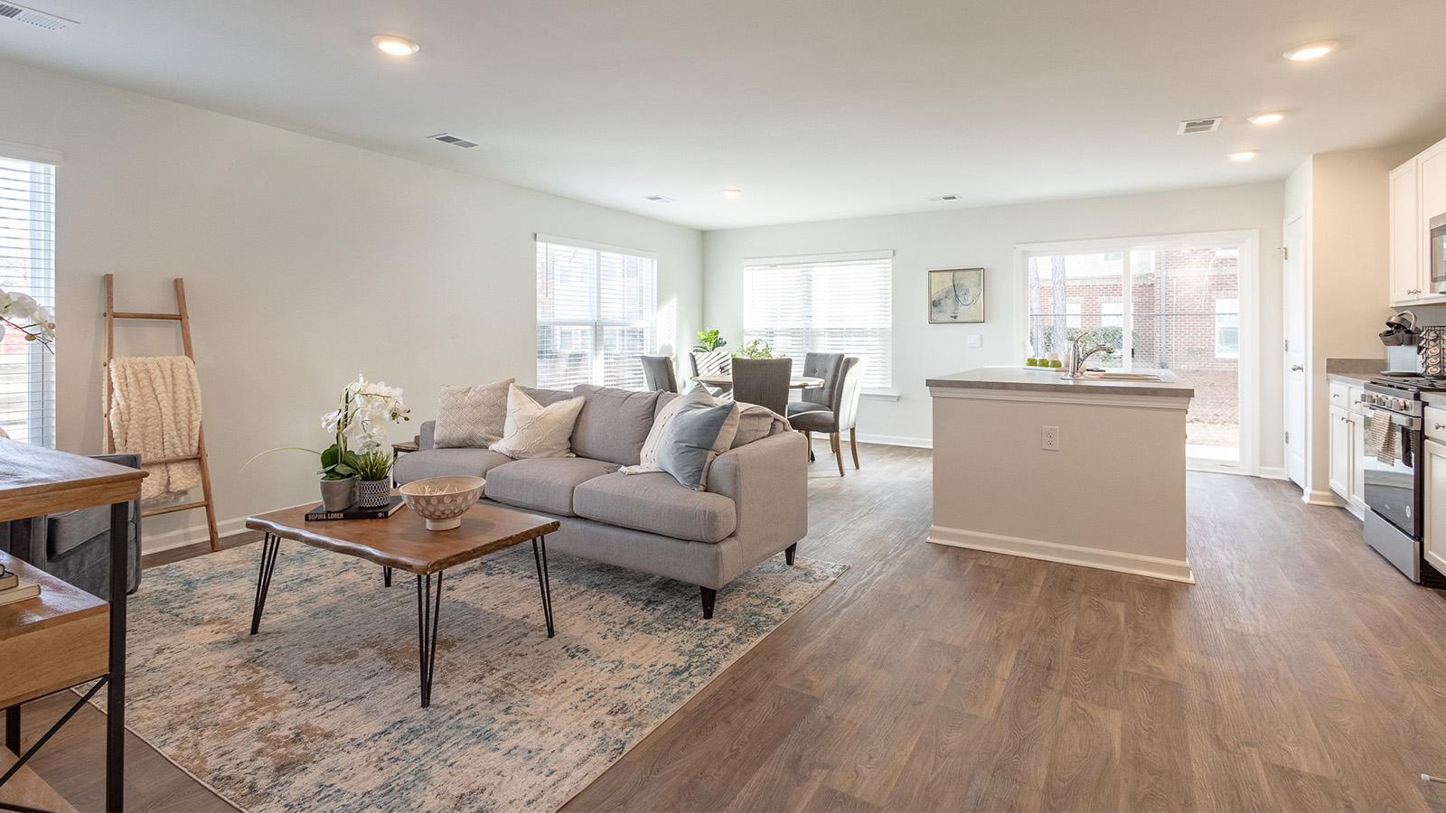 Spacious living area in the Dillon by D.R. Horton featuring contemporary finishes, open sightlines, and a functional layout that enhances modern townhome living in Brunswick, Georgia.