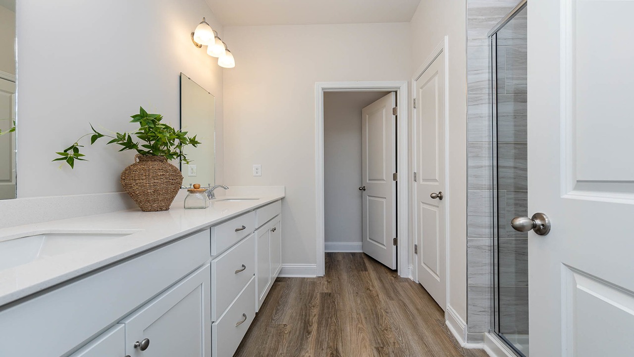 bathroom with quartz counters