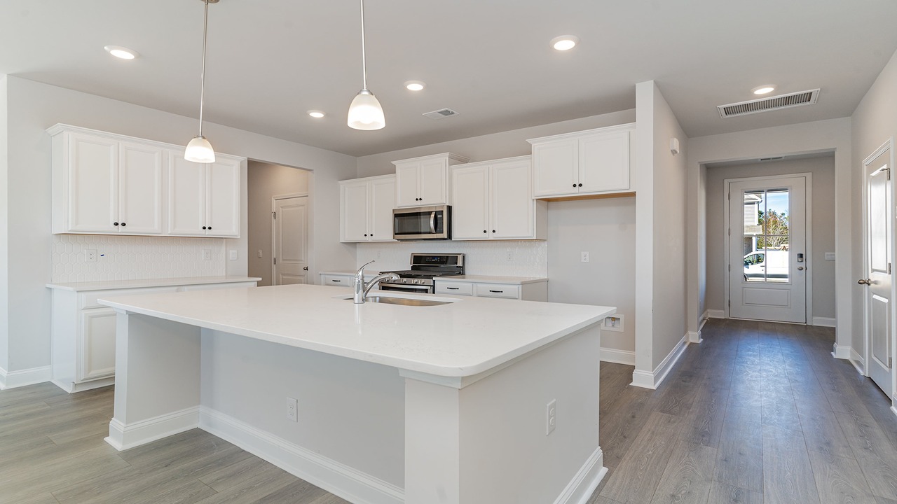 kitchen with white cabinets