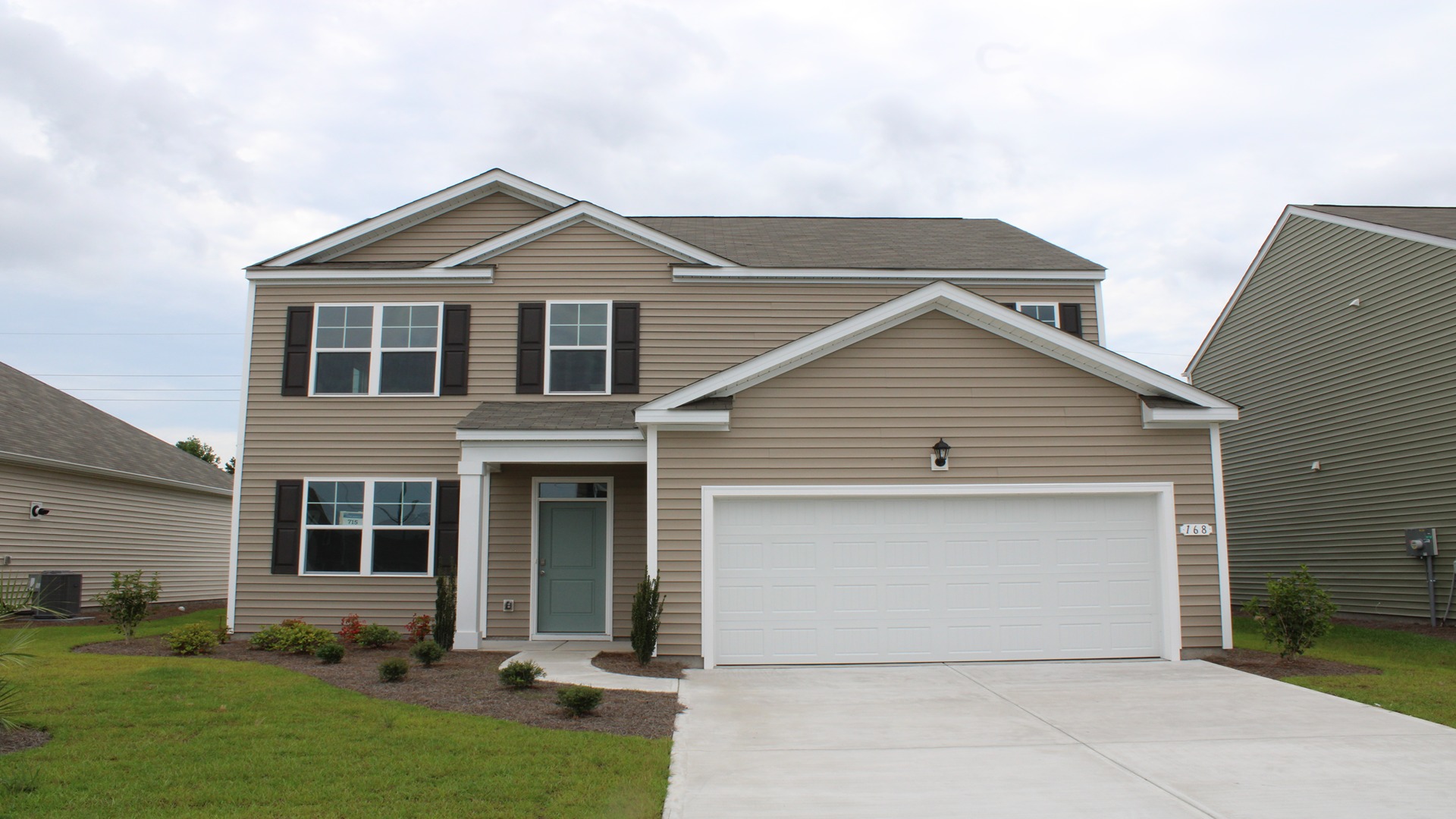two story home with vinyl siding