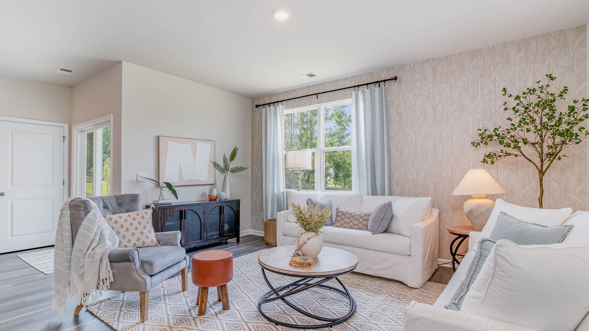 living room with ample lighting