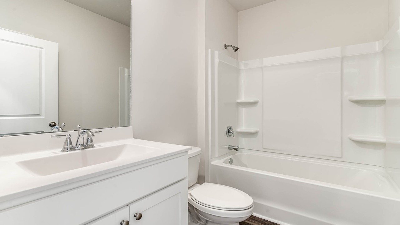 bathroom with quartz counters
