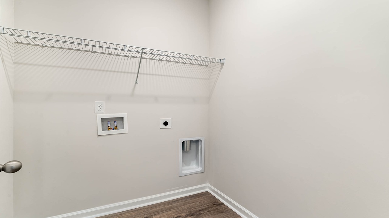 laundry room with wire shelving