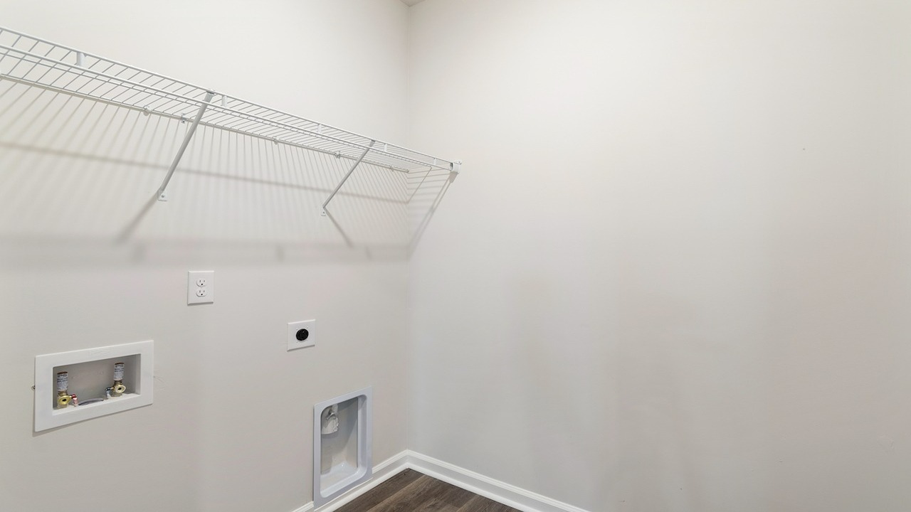 laundry room with wire shelving
