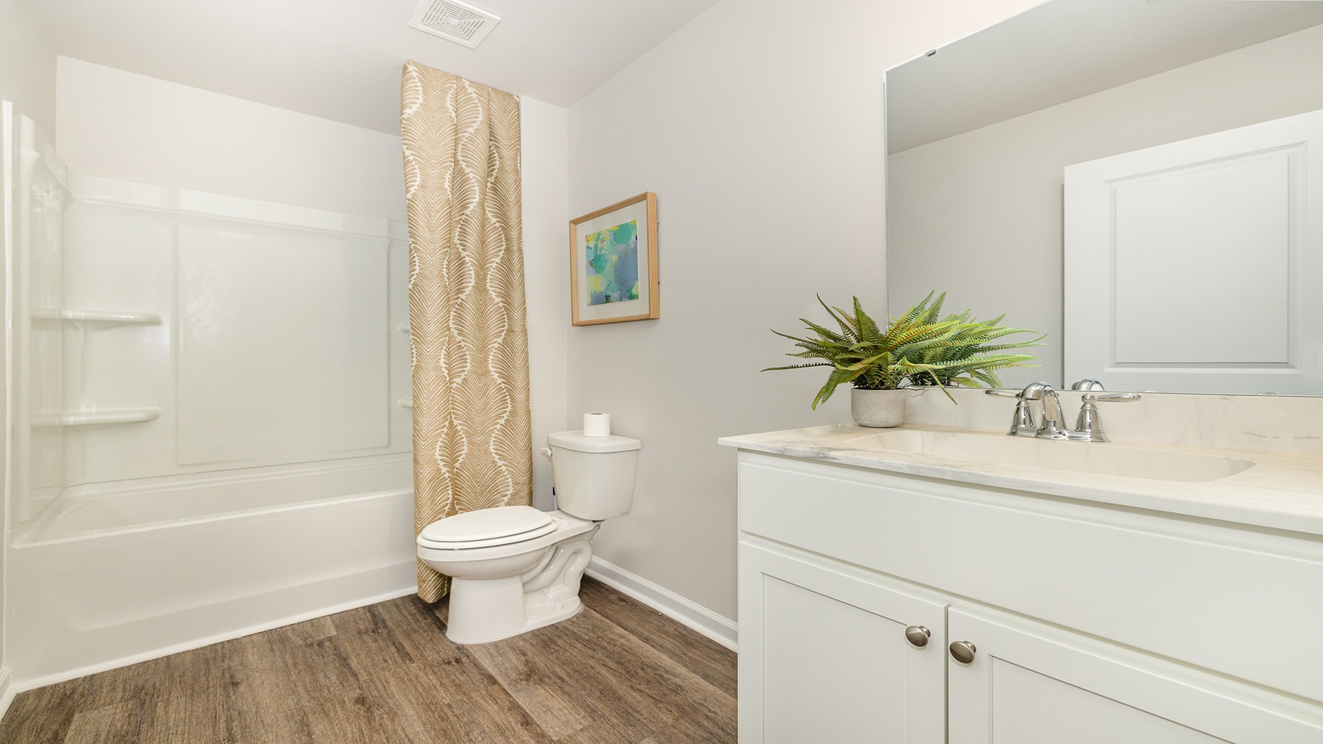 bathroom with quartz counters