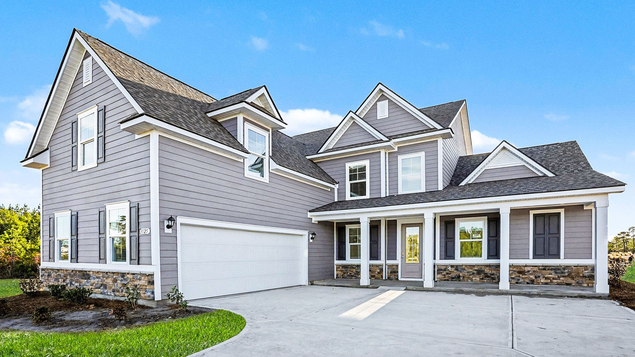 Alder two-story home with three-car garage