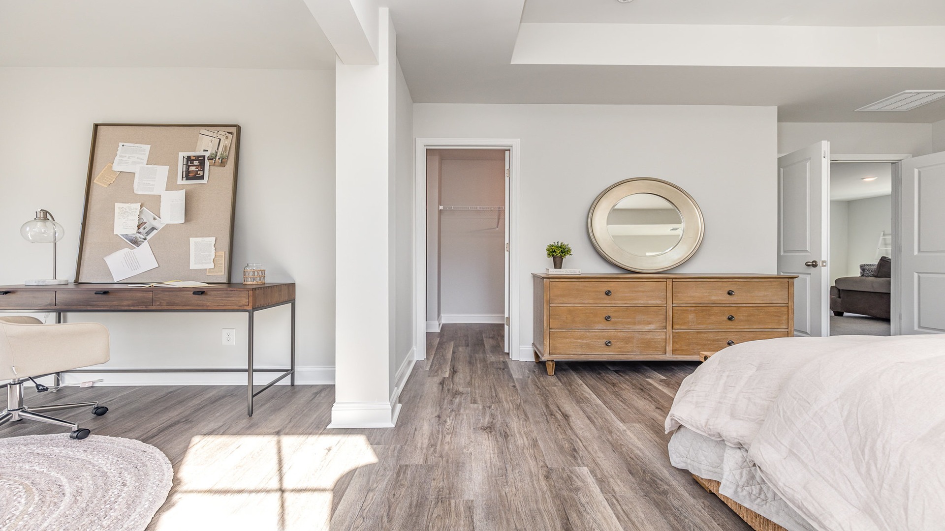 primary bedroom area with dresser