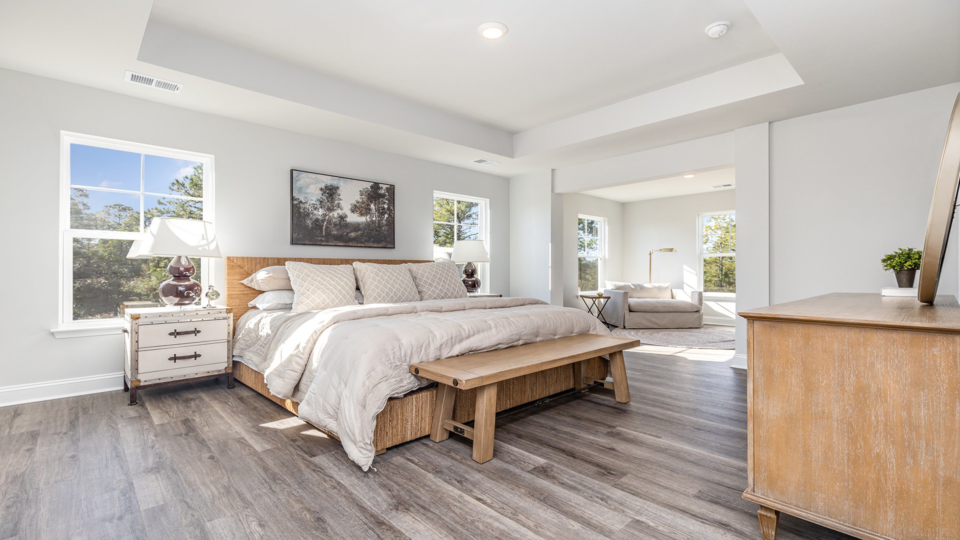 primary bedroom with lvp flooring