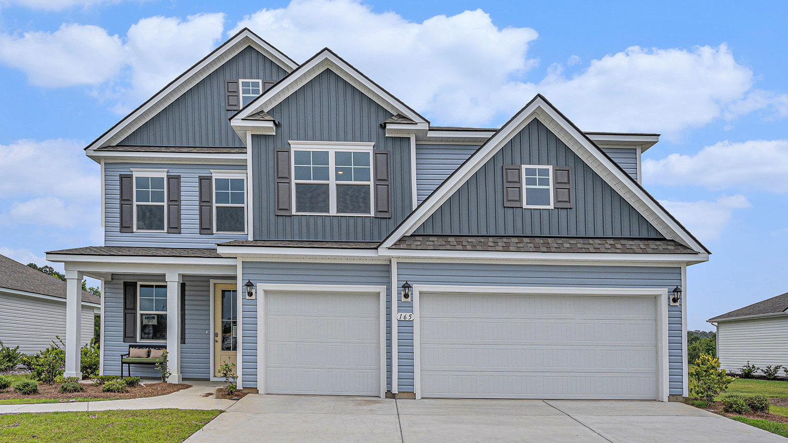 Two story home with three car garage