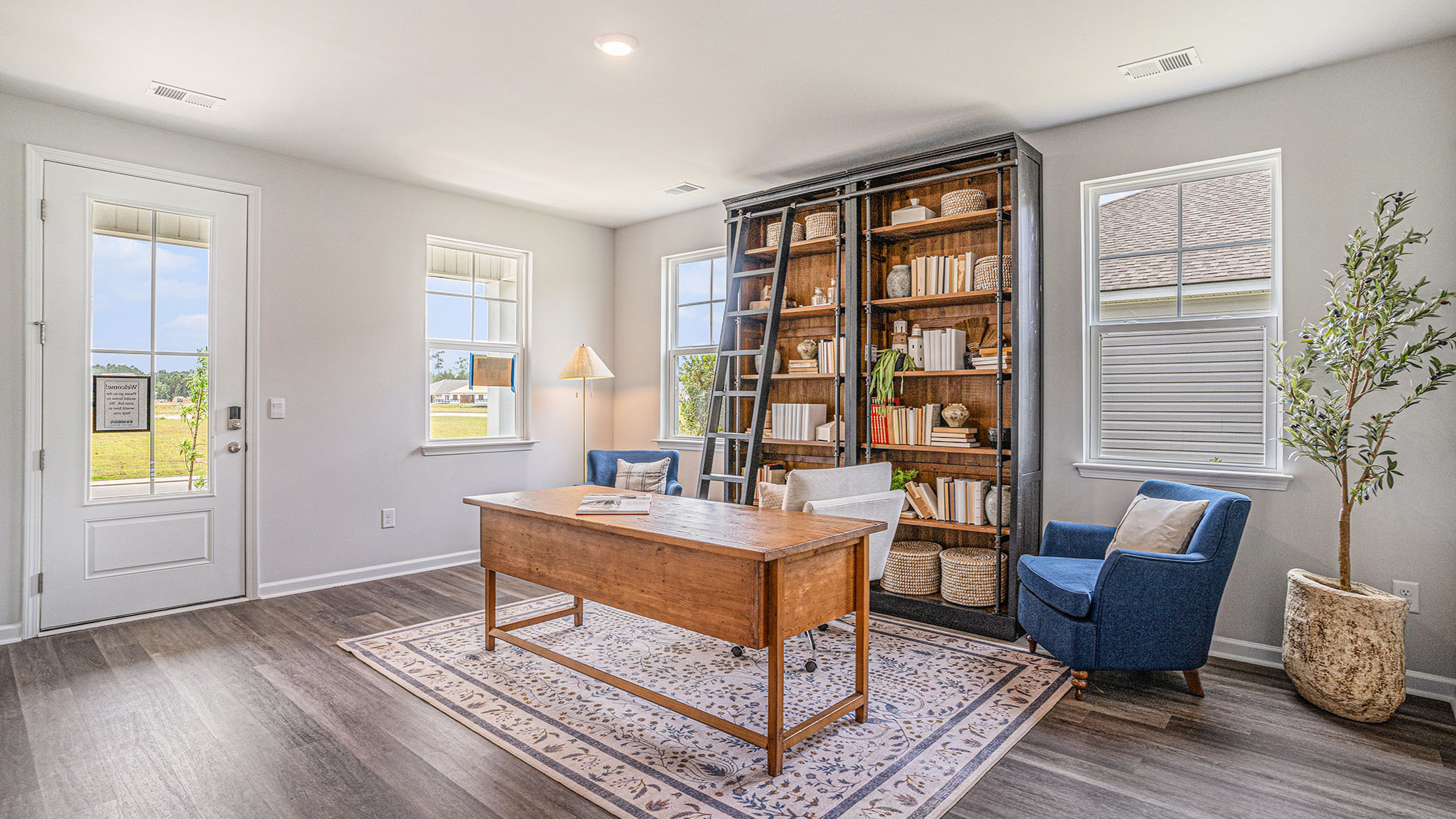 room with desk and windows