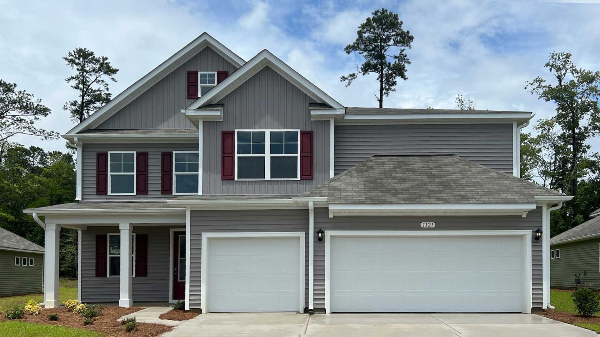 Two story home with three car garage