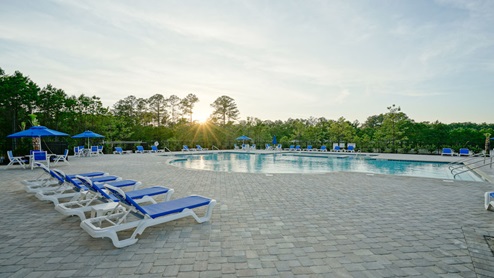 Community pool with chairs