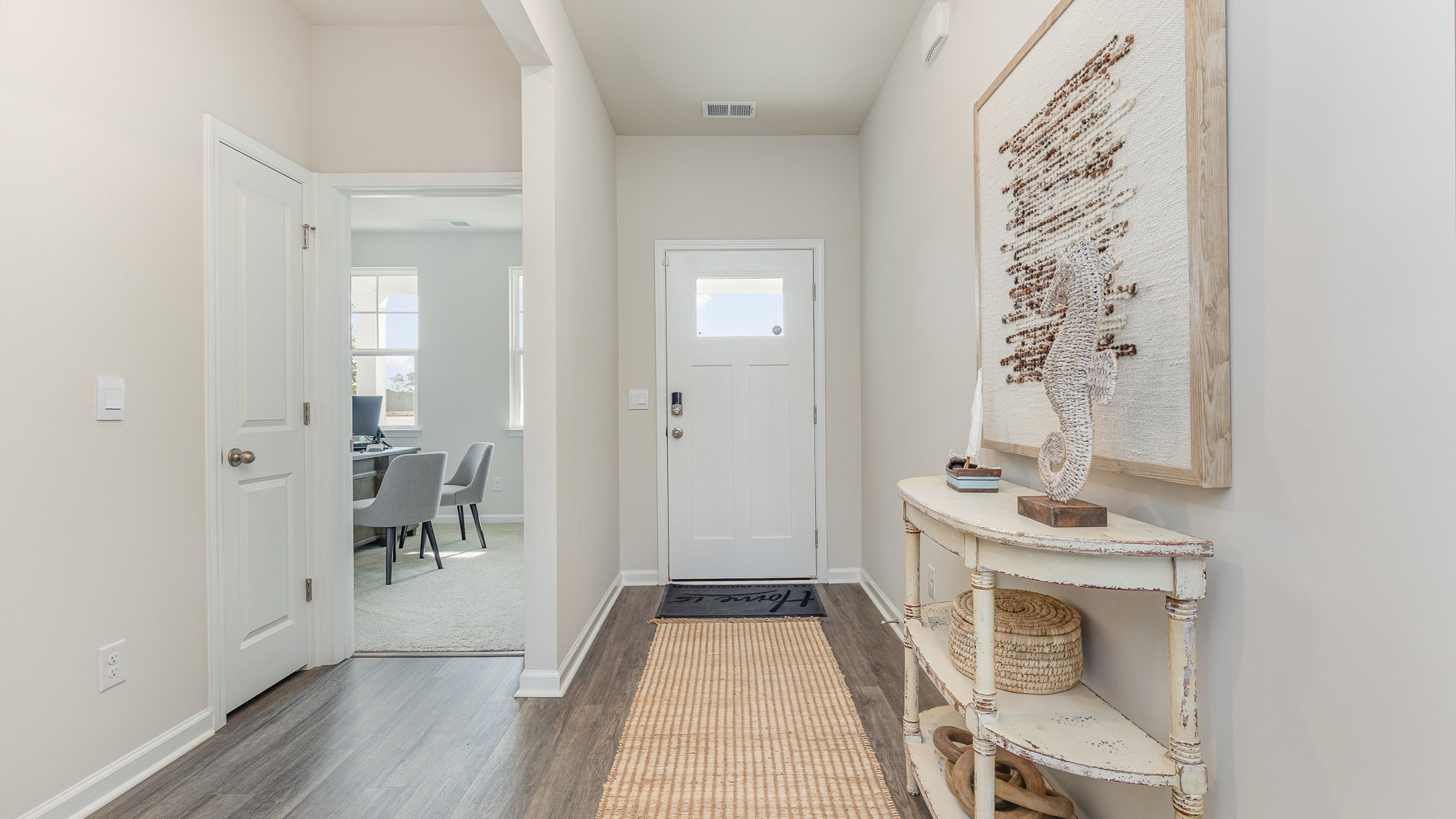 entryway with white door