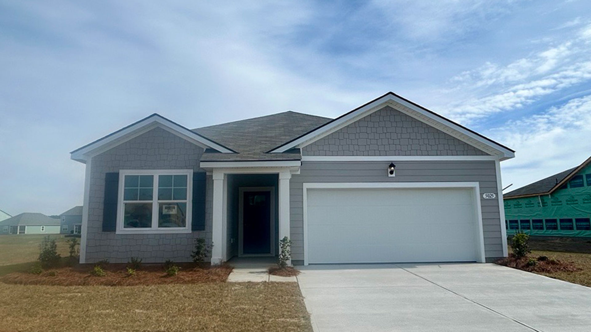 single story home with hardie siding