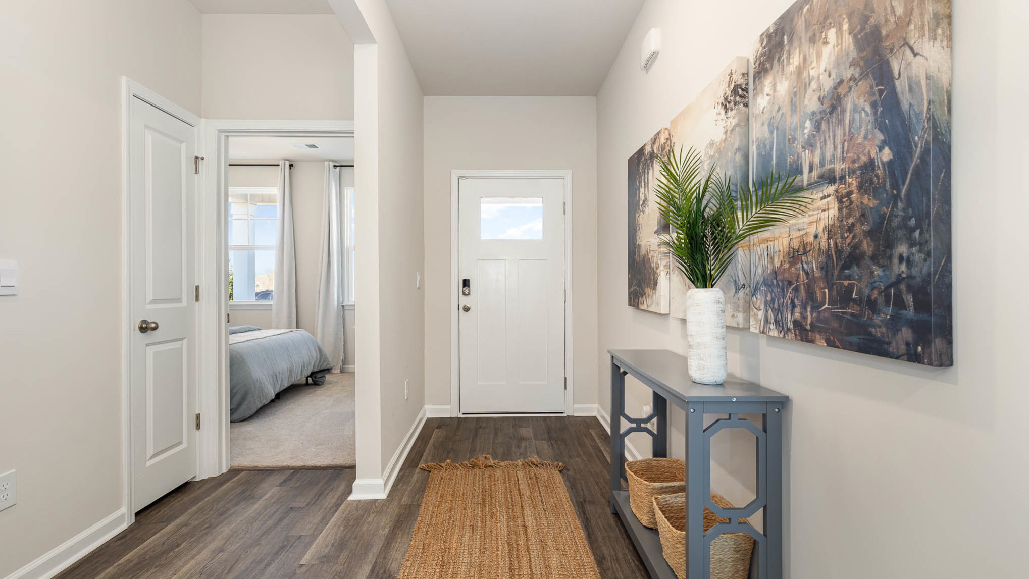 entryway with white door