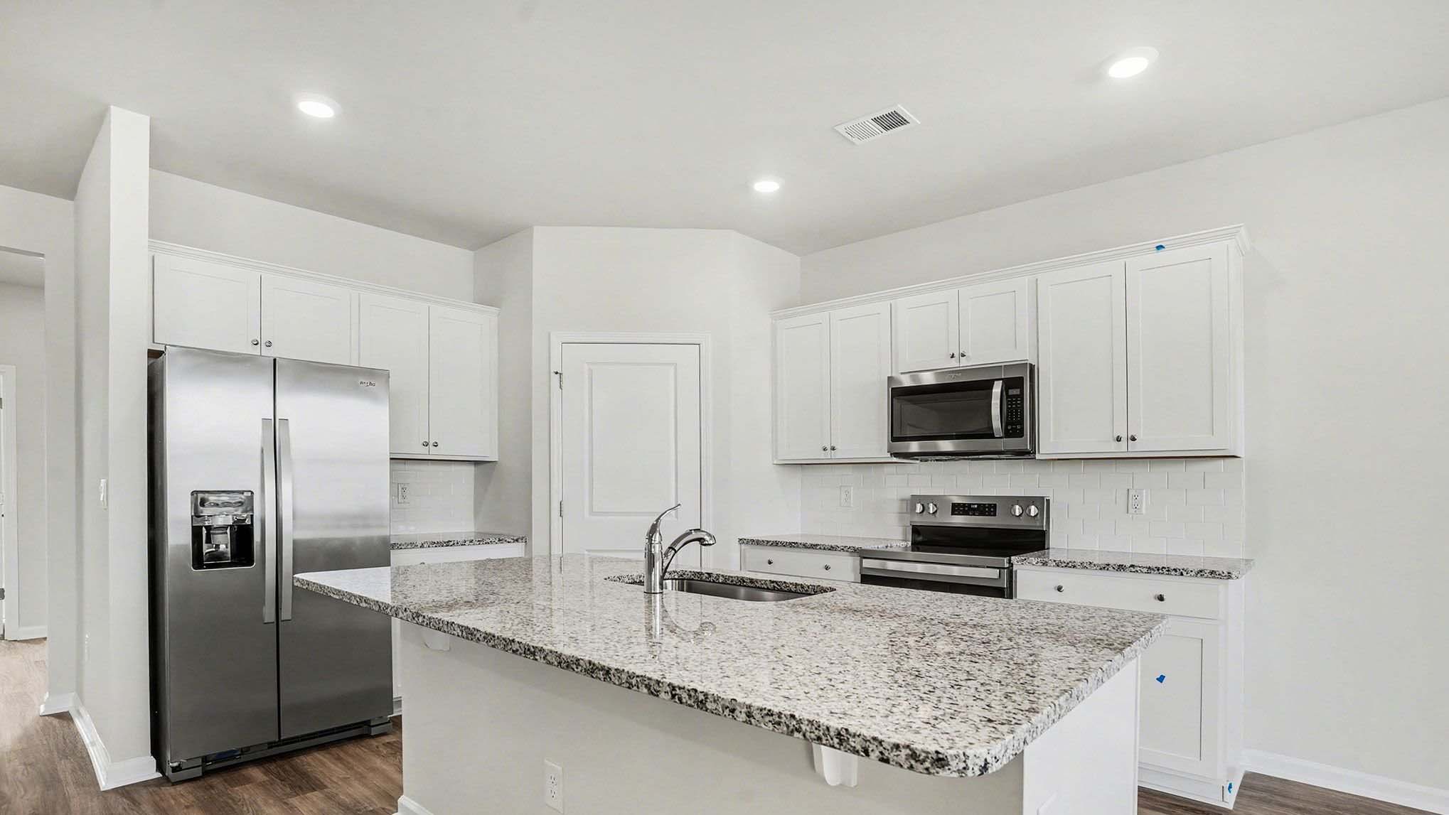 kitchen with white cabinets
