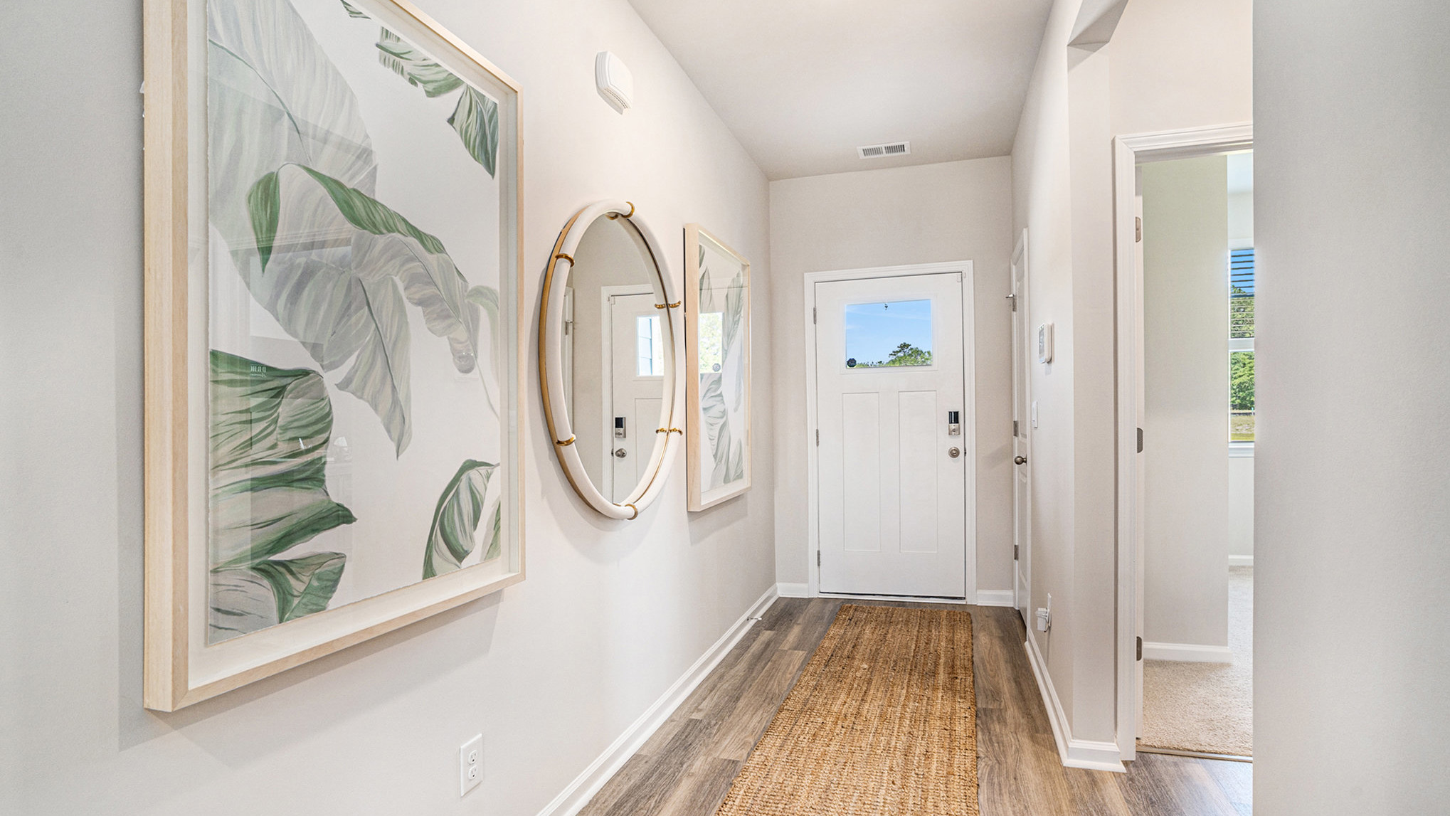 entryway with white door