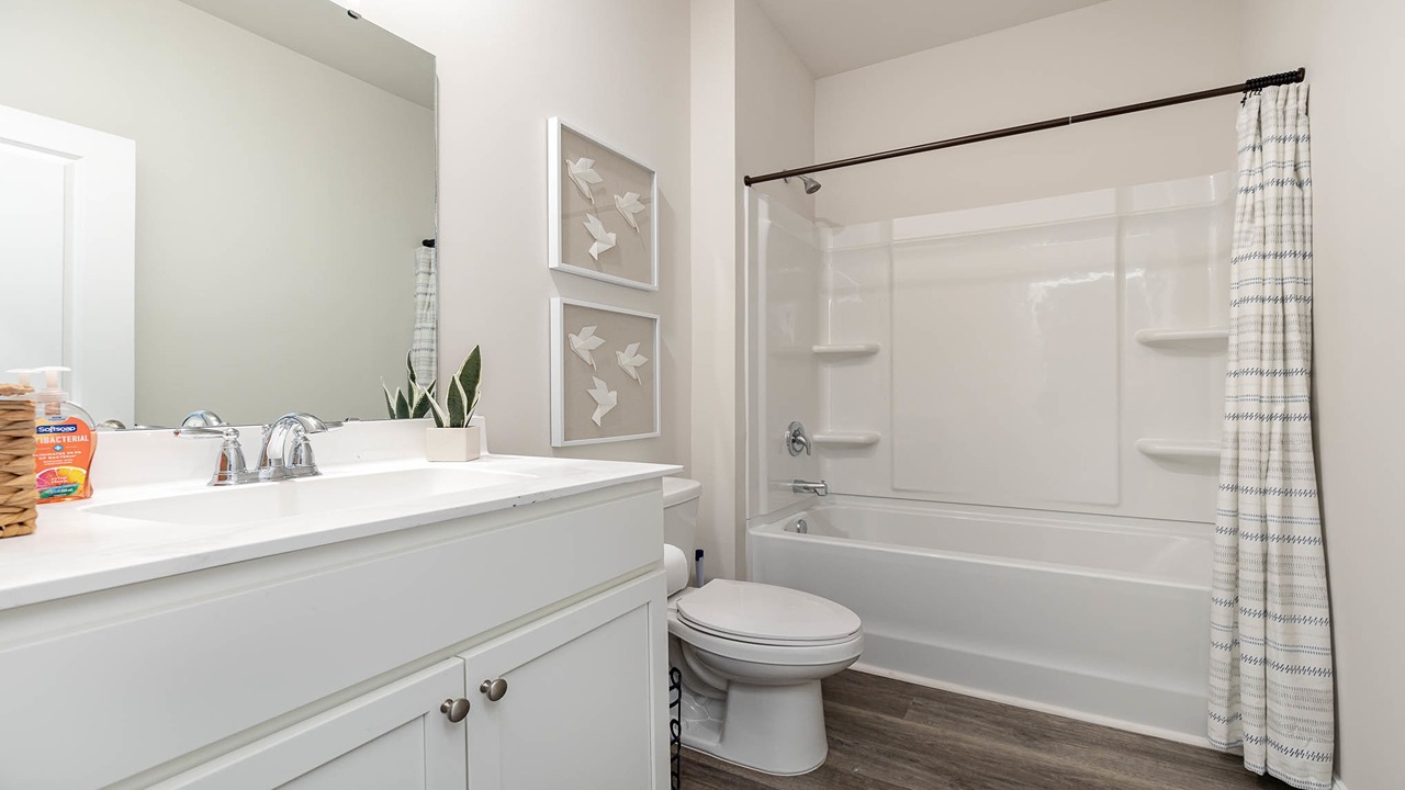 bathroom with quartz counters