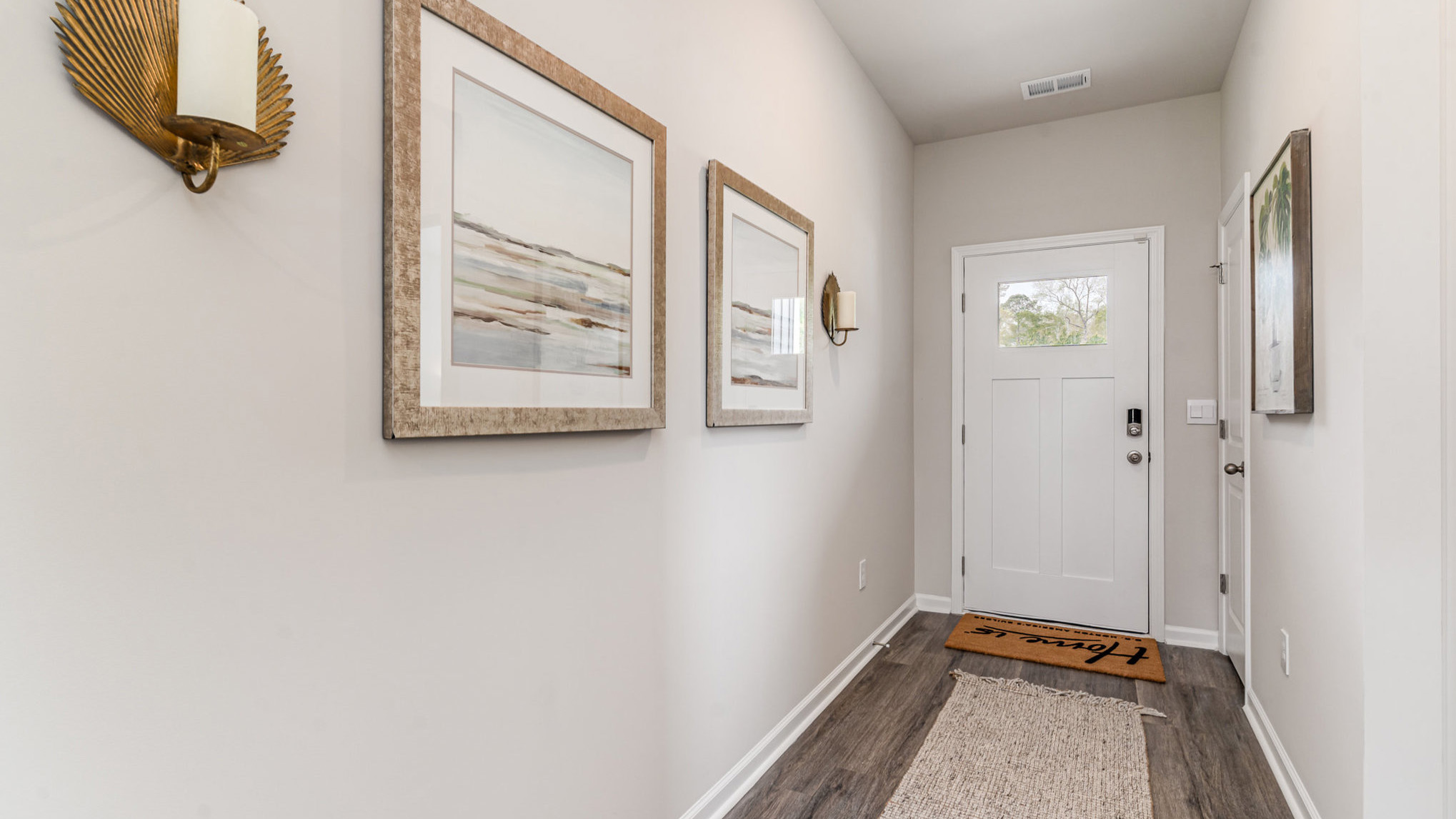 entryway with white door