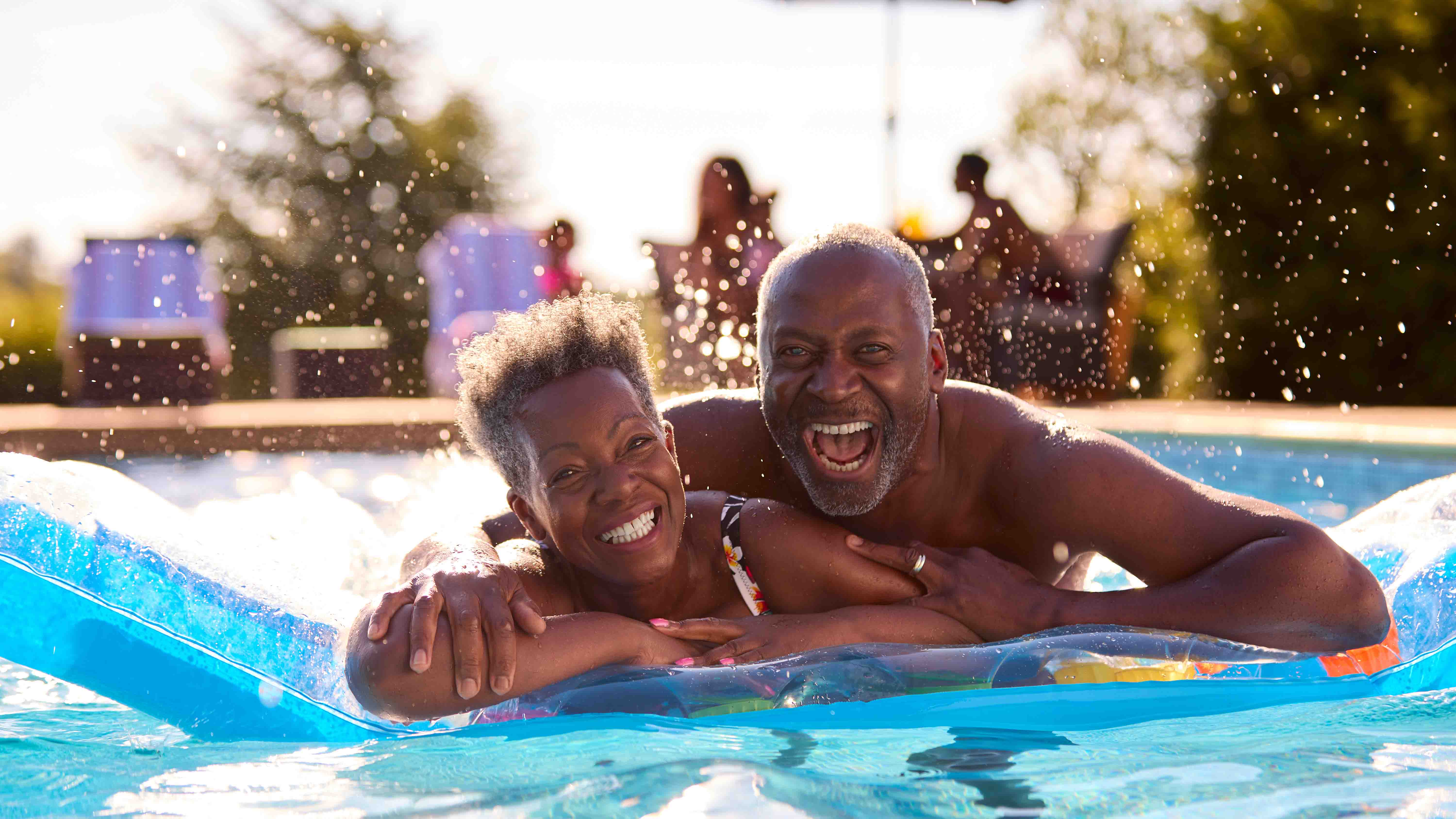 Happy Couple Swimming