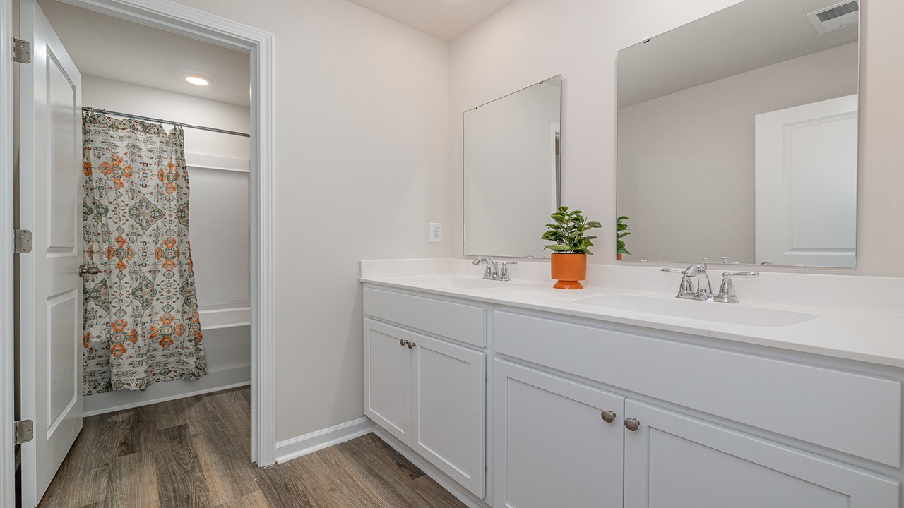 bathroom with quartz counters