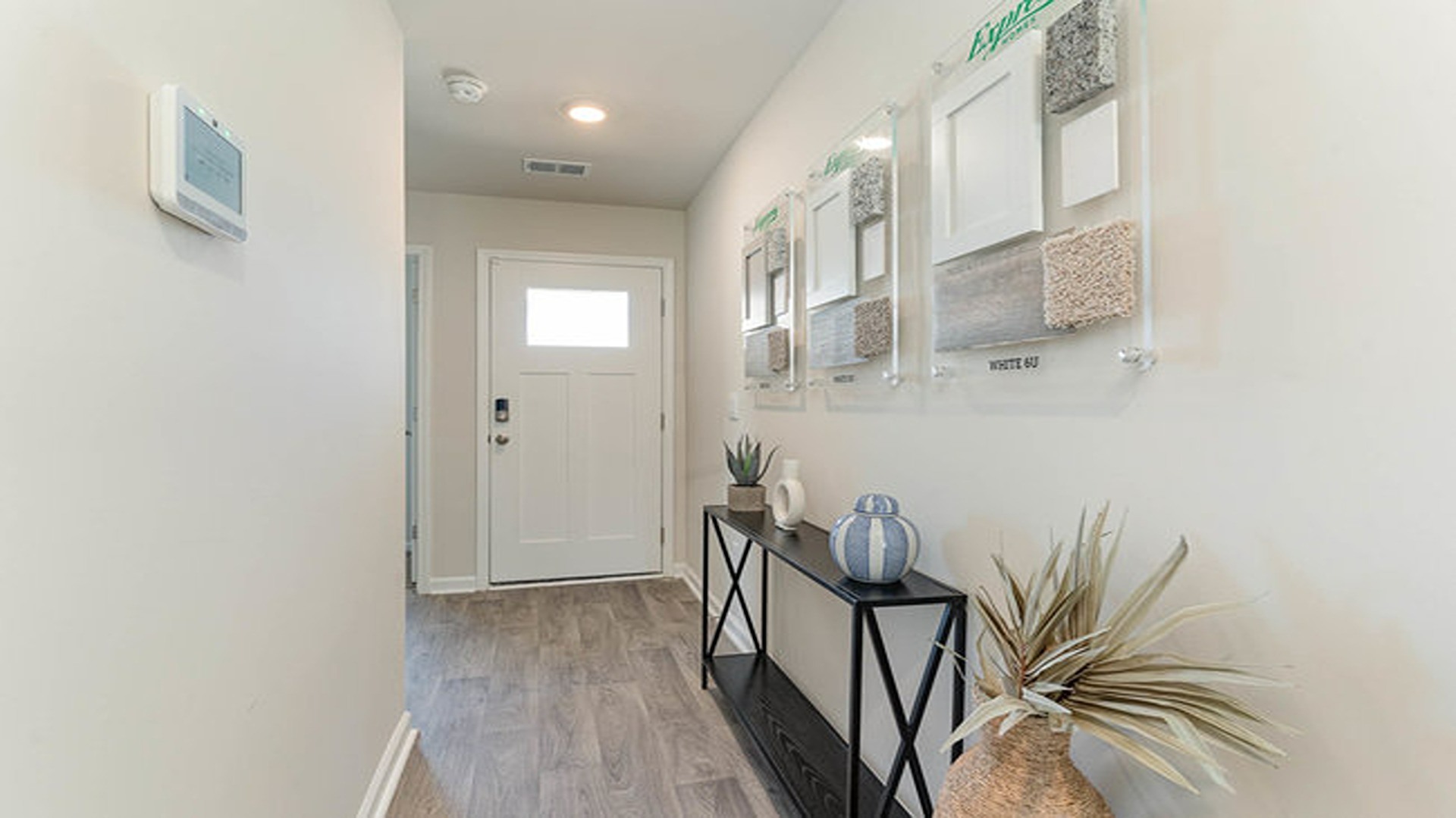 entryway with white door