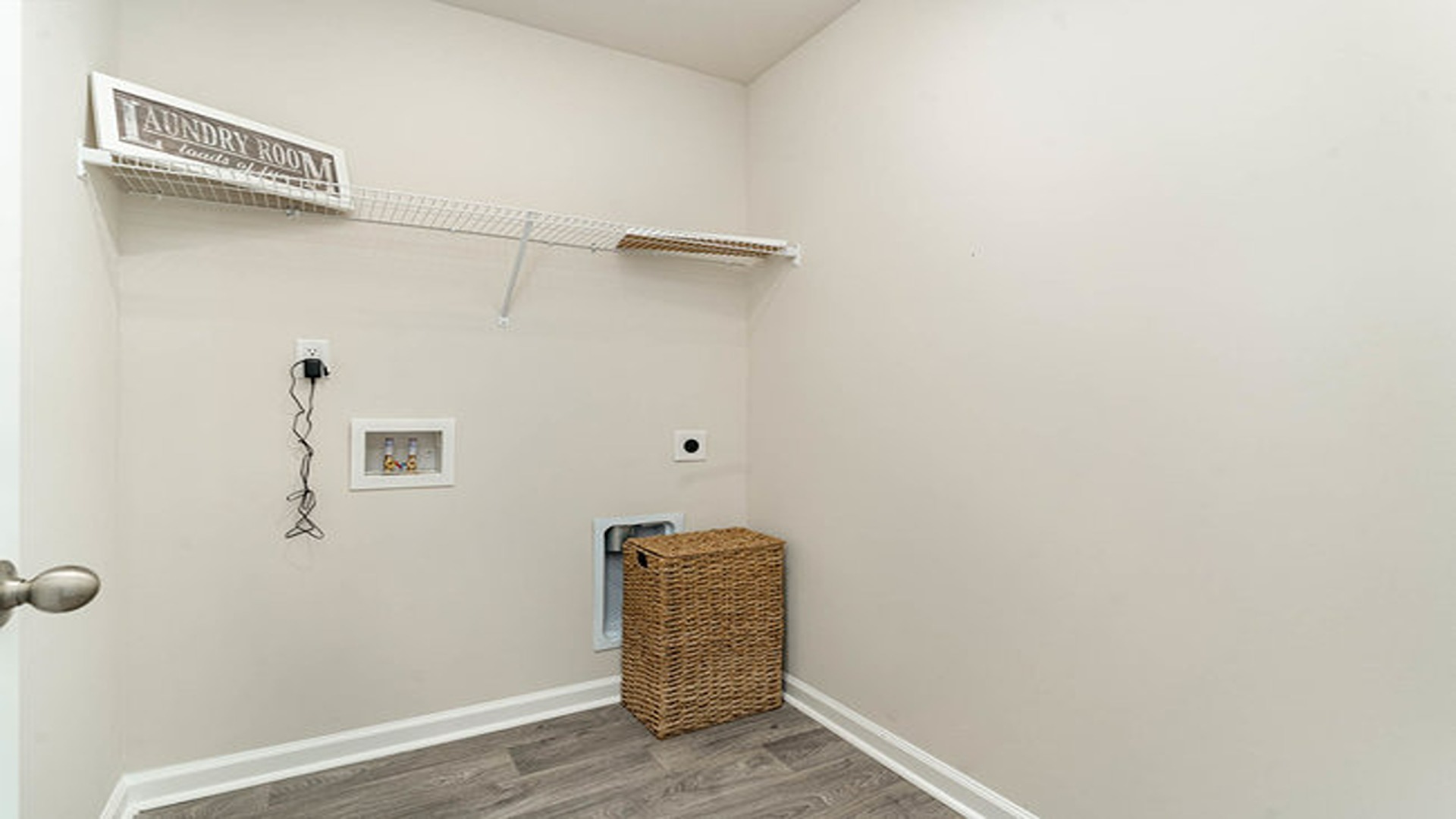 laundry room with wire shelving