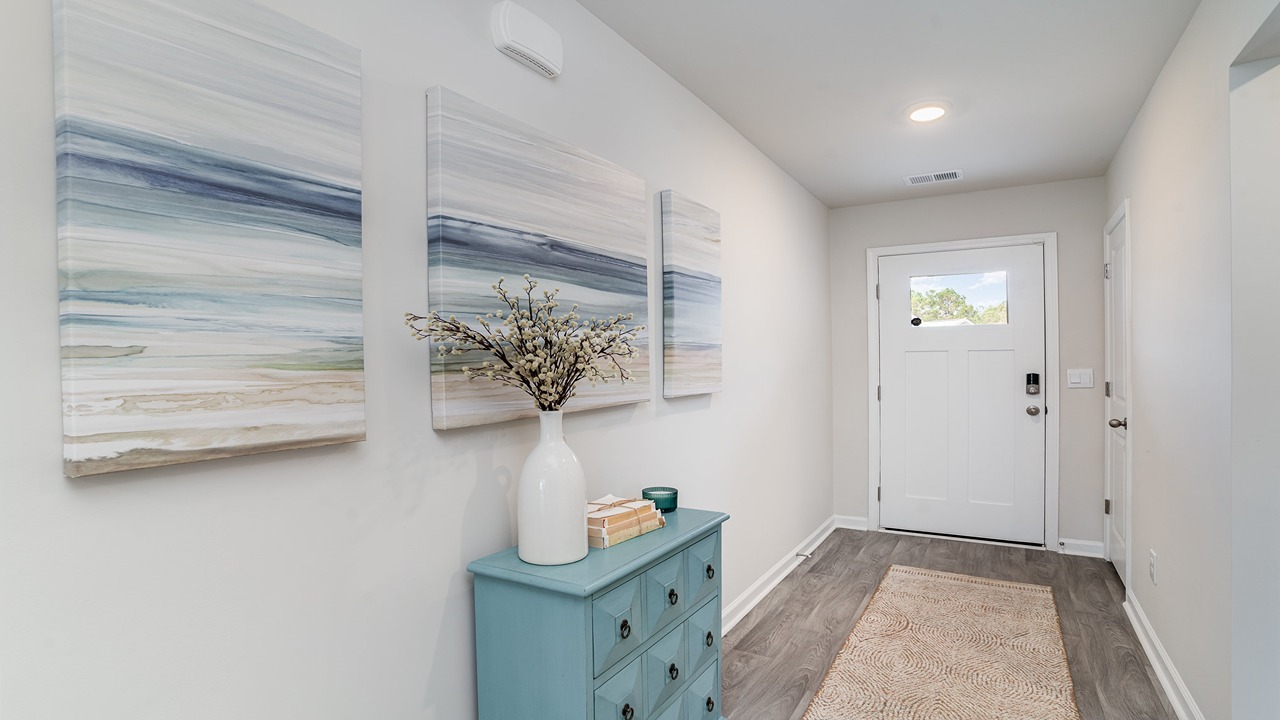 entryway with white door