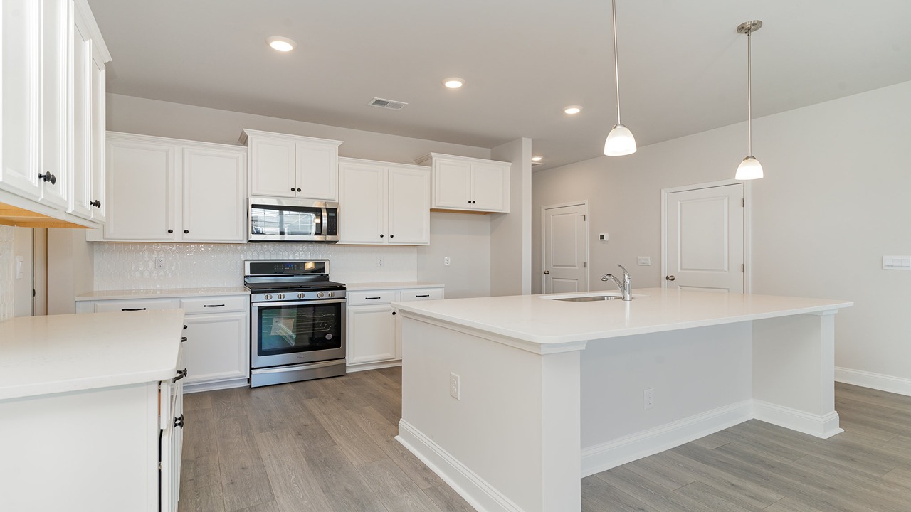 kitchen with white cabinets