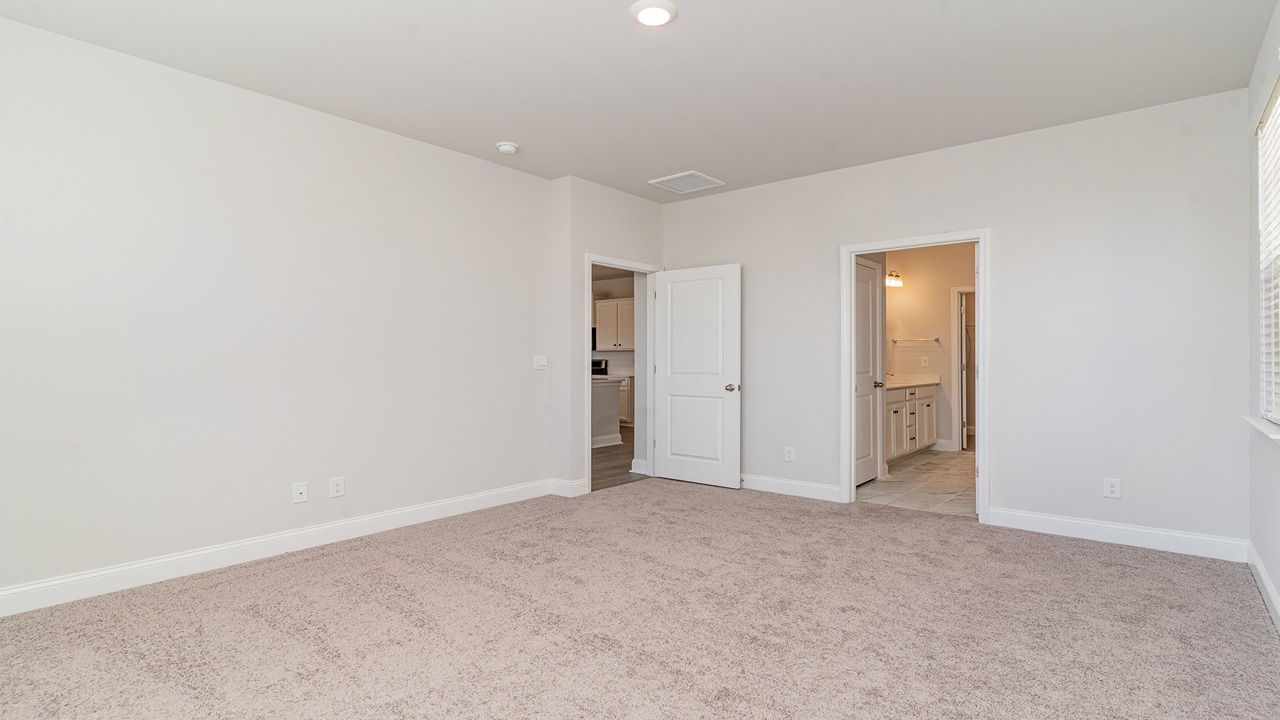 primary bedroom with double window