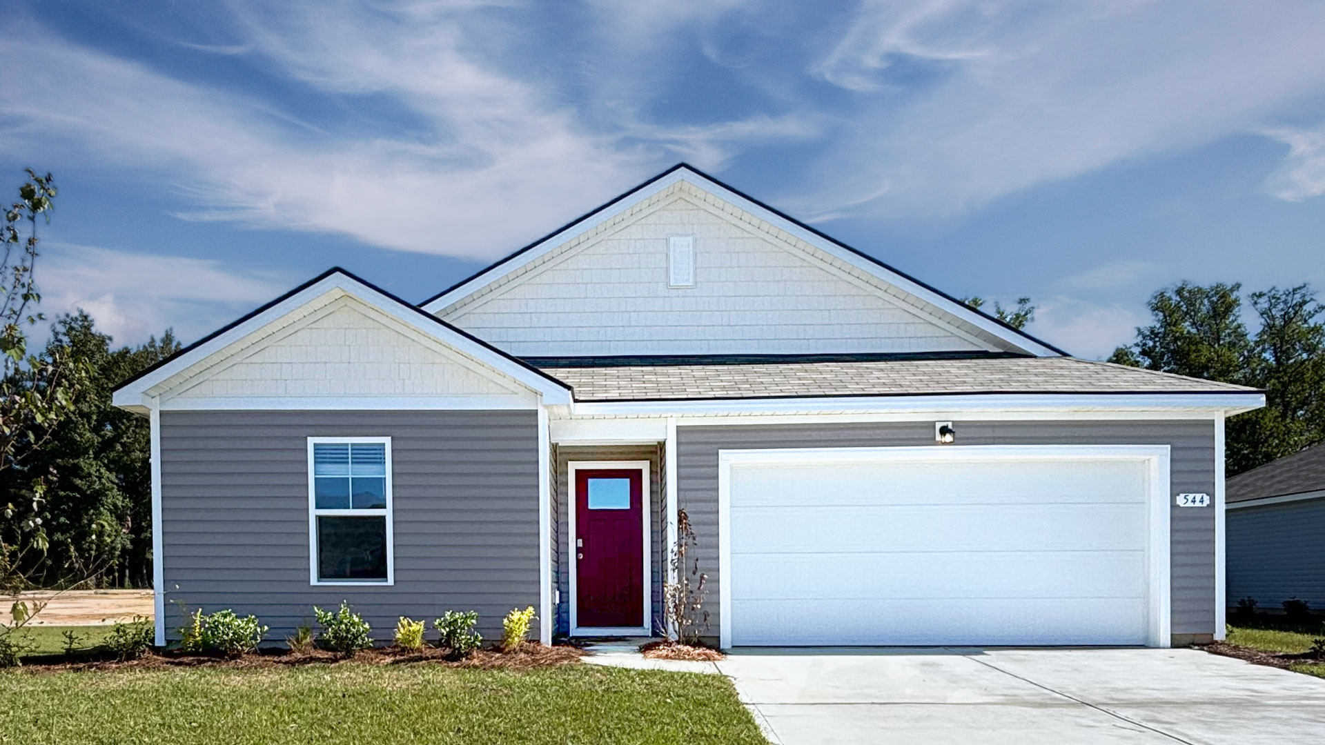 single story home with two-car garage