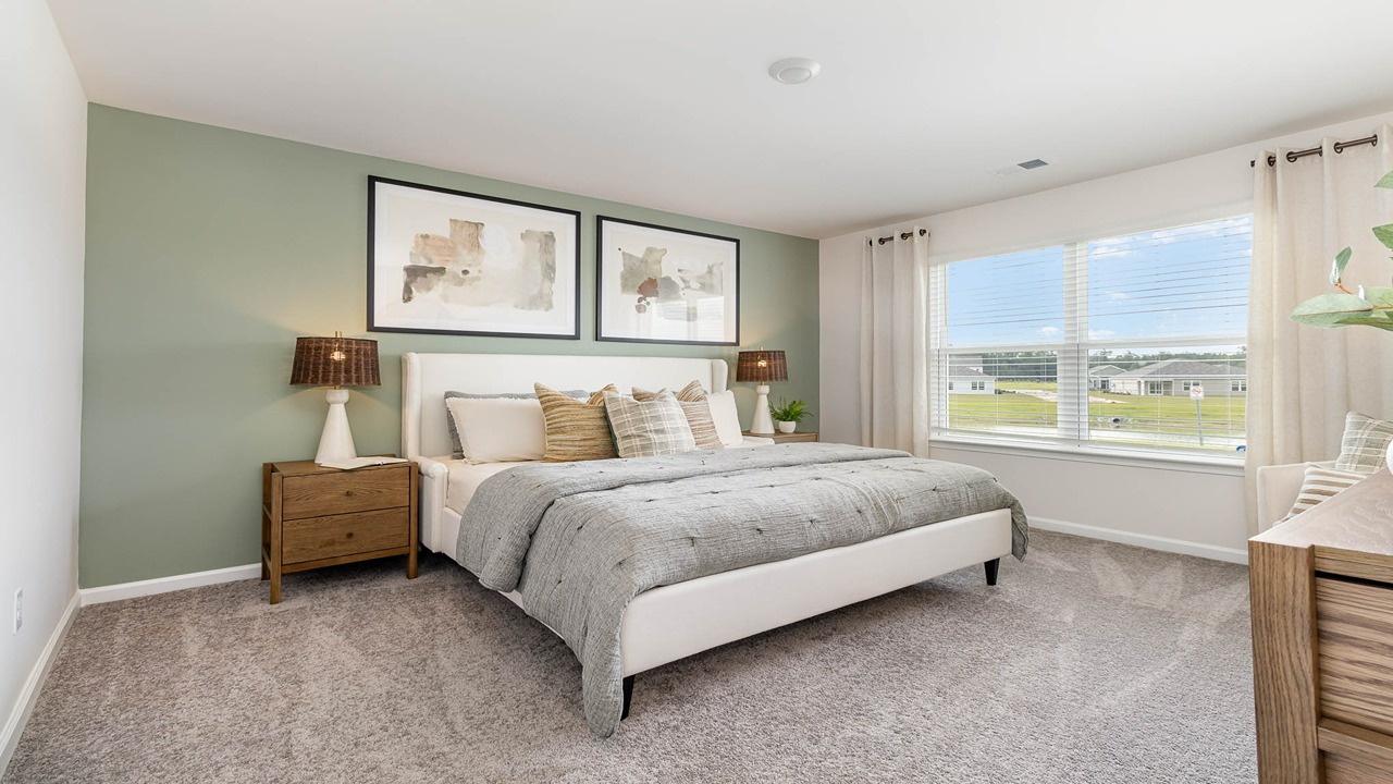 primary bedroom with carpet