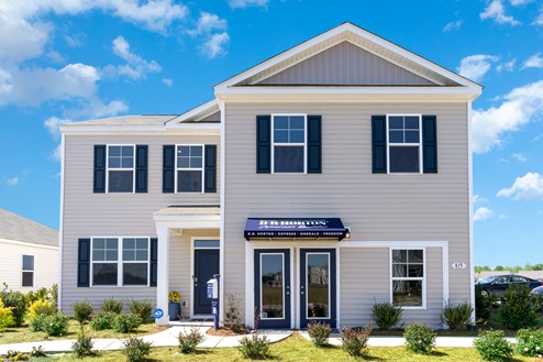Galen exterior with vinyl siding and black shutters