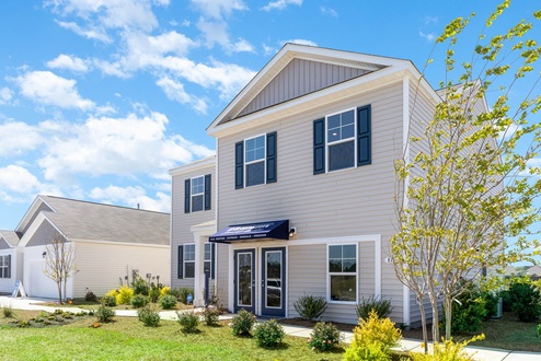 Galen exterior with vinyl siding and black shutters