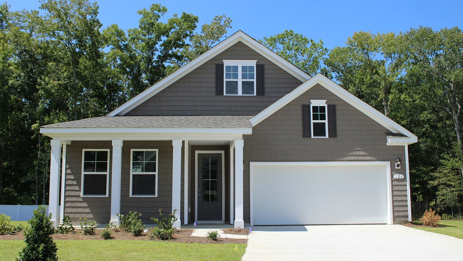 Home with Front Porch and Two-car Garage