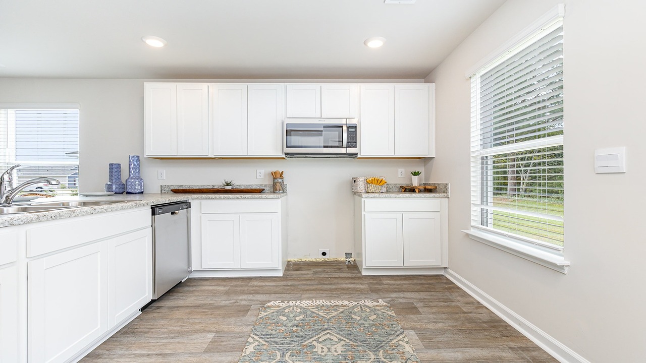 kitchen with white cabinets
