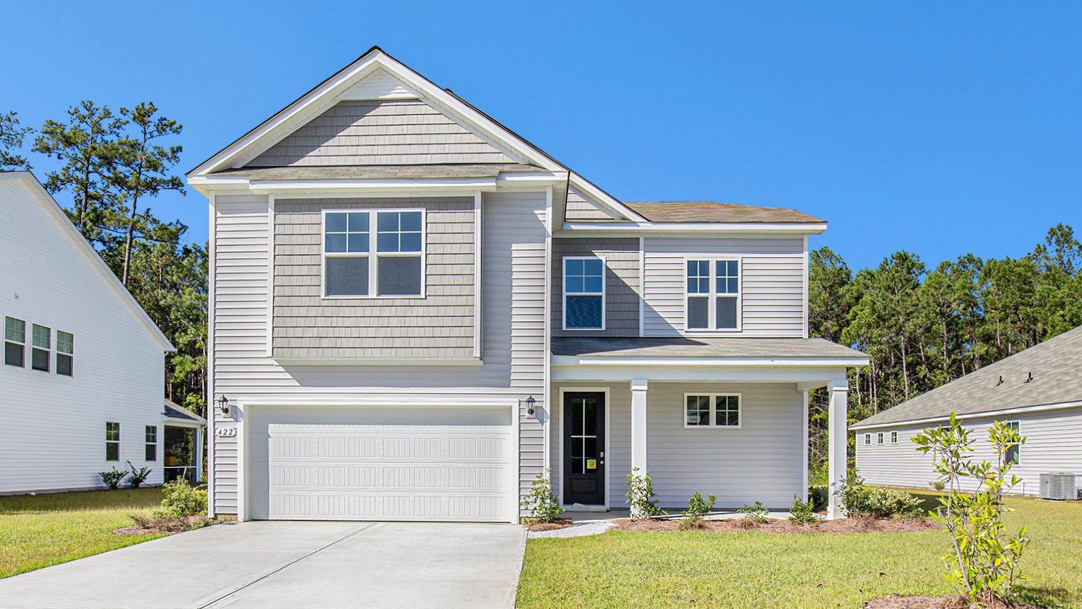 two story home with vinyl siding