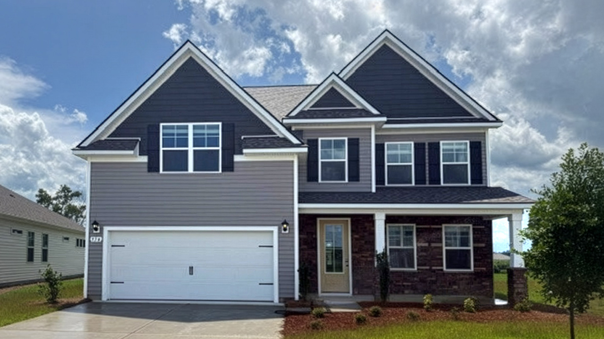 two story home with vinyl siding